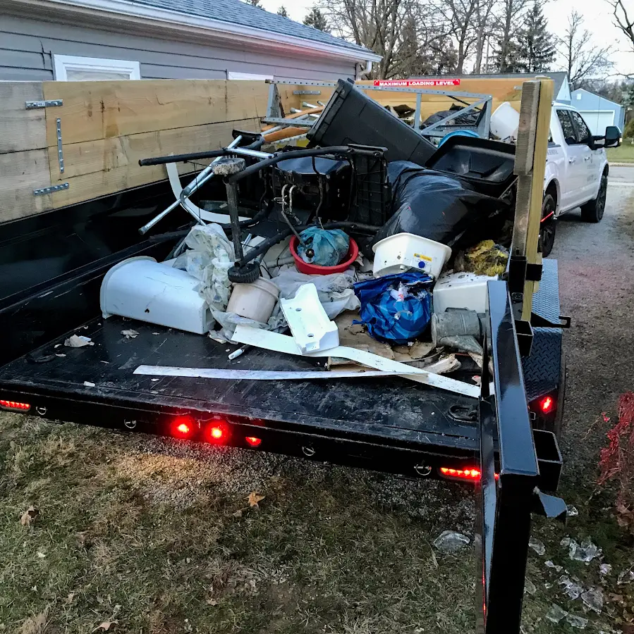 Roll-off dumpster delivered to a residential driveway in Compton